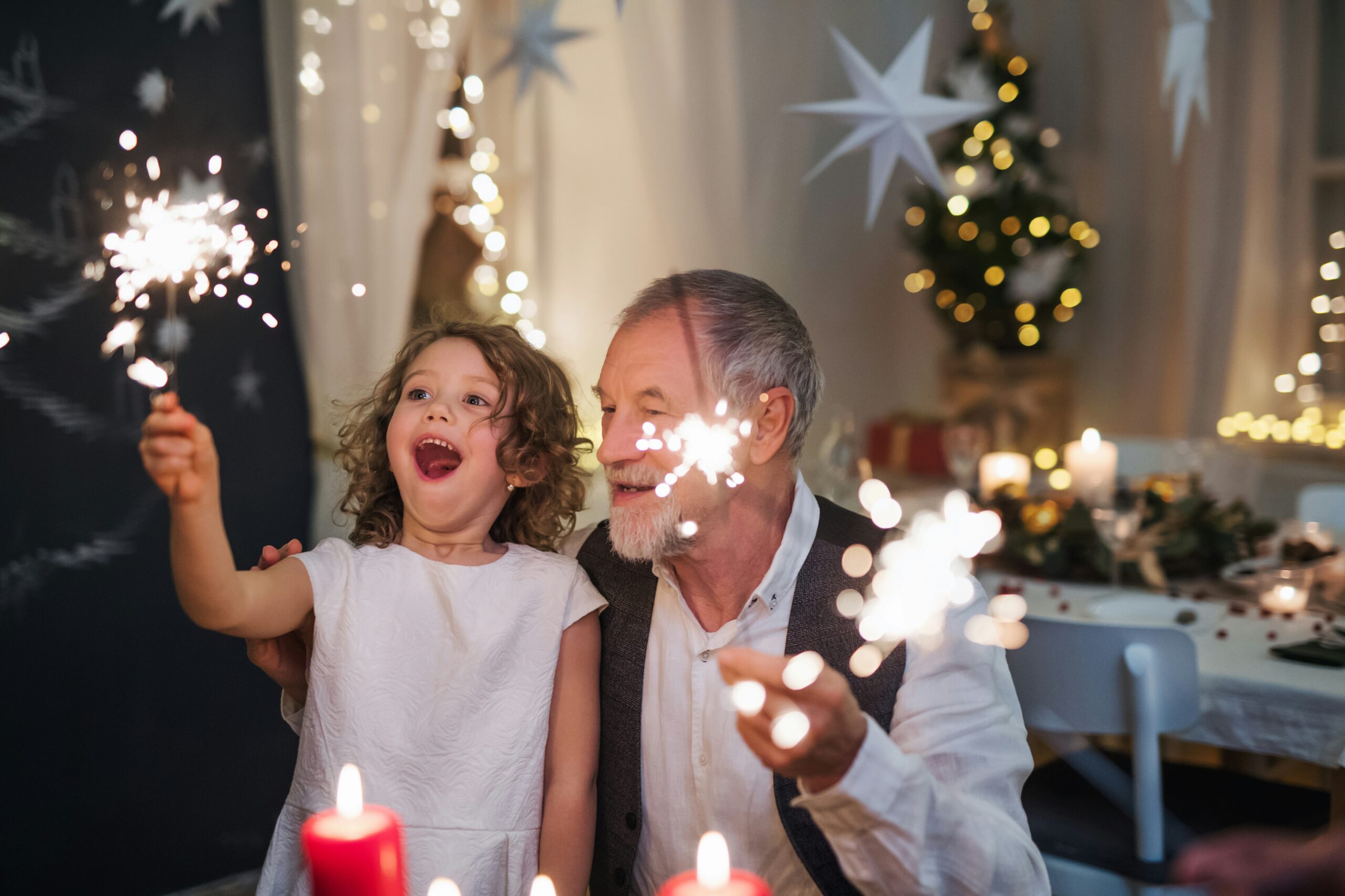 grandad celebrating with his grand daughter